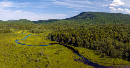 Aerial landscape panoramic of Speculator, New York located in the Adirondacks. July 10, 2022