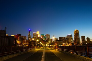 Fototapeta na wymiar Night view of Stone Arch Bridge and downtown Minneapolis, Minnesota