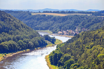 Obraz premium Beautiful landscape - view of the Elbe river and Sandstone mountains in Saxon Switzerland National Park, Germany