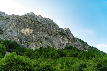 Montenegro. Prokletiye National Park. Summer. Mountain range. Green mountain peaks
