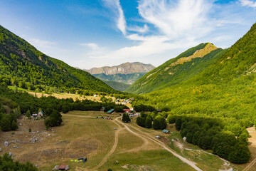 Fototapeta na wymiar Montenegro. Prokletiye National Park. Summer. Mountain green valley. Popular tourist spot. Drone. Aerial view