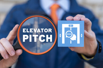 Business concept of elevator pitch. Businessman holding magnifier with inscription of elevator...