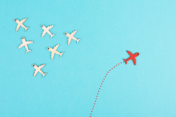Airplanes following the group, red plane thinks different and takes the opposite direction,...