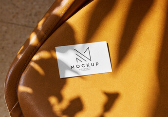 Business Card Mockup on Leather Chair with Shadows