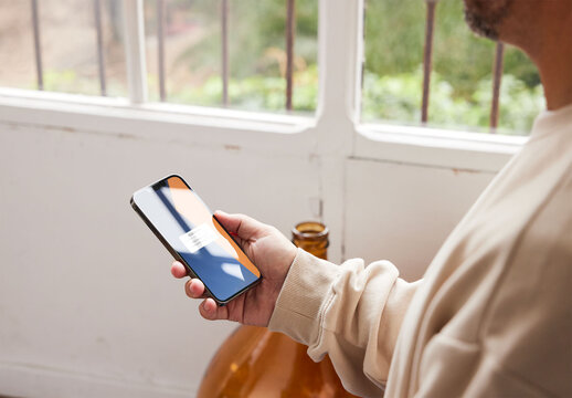 Man Using Smartphone Mockup with Natural Light
