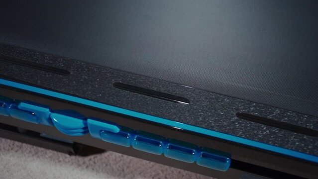 closeup of cushioning system of modern treadmill for running or workout