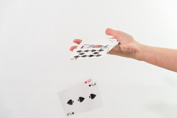 person shuffling cards for a card game