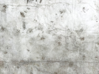 Gray concrete wall with stains and scratches