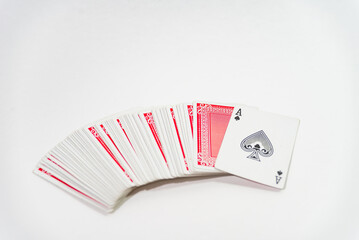 deck of cards face down on a white table