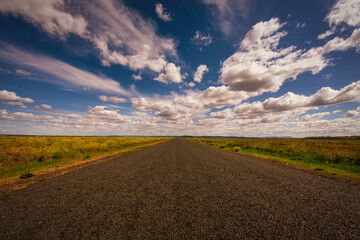 endless road and cloudscape