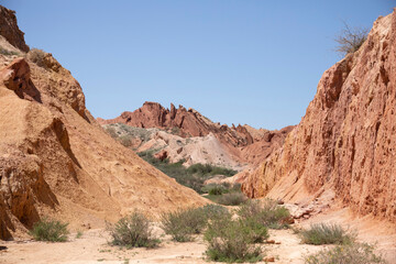 Fototapeta na wymiar The strange desert formations of Skazka, or Fairytale Canyon in Kyrgyzstan.