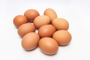 Close-Up of Fresh Raw Chicken Eggs on a White Background