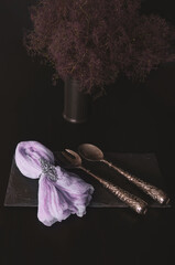 Bouquet of lavender on a black board made of raw stone