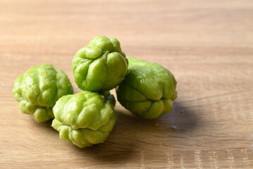 Chayote squash fruit on wooden background, Organic vegetables