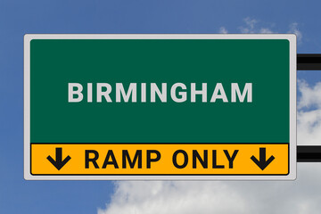 Birmingham logo. Birmingham lettering on a road sign. Signpost at entrance to Birmingham, USA. Green pointer in American style. Road sign in the United States of America. Sky in background