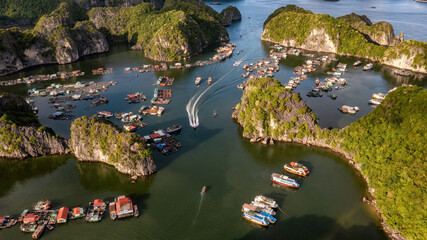 Floating fishing village and rock island in " Lan Ha " Bay, Vietnam, Southeast Asia