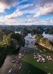 Floating fishing village and rock island in " Lan Ha " Bay, Vietnam, Southeast Asia