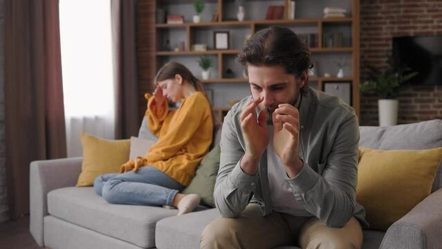 Sad thoughtful man feel upset after quarrel with girlfriend. Misunderstanding, betrayal. Breaking up or divorce, family conflicts, marriage crisis, difficult relationships.