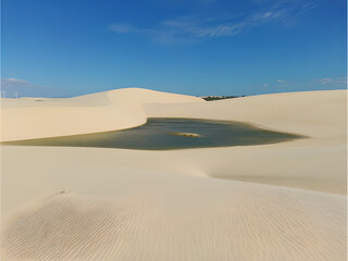 A lake amid sand dunes
