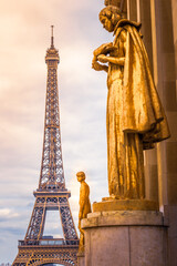 Eiffel tower from Trocadero with golden statues, Paris, France - obrazy, fototapety, plakaty