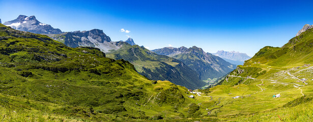 Fototapeta na wymiar Panoramic view over the mountains from Klausen Pass in Switzerland - travel photography