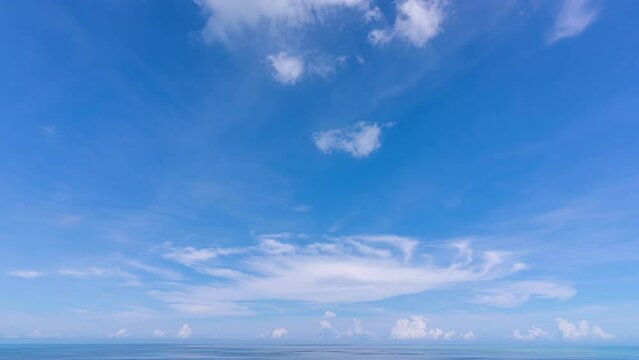 Motion white clouds Time lapse Beautiful Blue sky and white clouds flowing over sea in summer season Good weather day Time Lapse in Phuket Thailand Concept Travel background nature environment