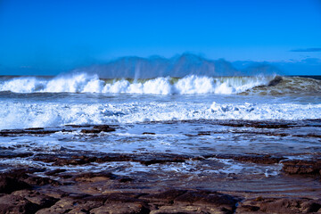 Beach waves crashing to shore
