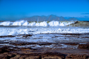 Beach waves crashing to shore