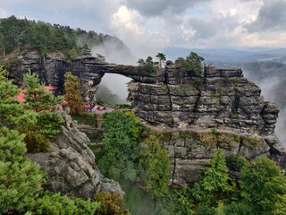 Famous Pravčice Gate landmark in Czech Switzerland National Park, Hřensko on the cloudy autumn day