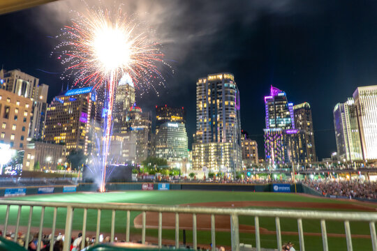 fireworks show over charlotte skyline post baseball game