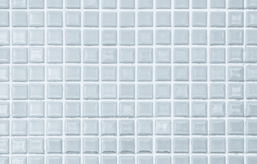 White ceramic wall and floor tiles mosaic background in bathroom and kitchen. Design pattern geometric with grid wallpaper texture decoration pool.