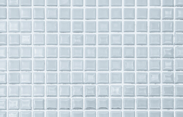 White ceramic wall and floor tiles mosaic background in bathroom and kitchen. Design pattern geometric with grid wallpaper texture decoration pool.