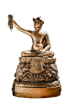 Bronze figurine of Phra upagupta or Phra bua khem statue isolated on white background with clipping path. Selective focus.