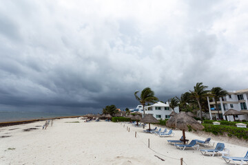 A beach and ocean before tropical thunderstorm