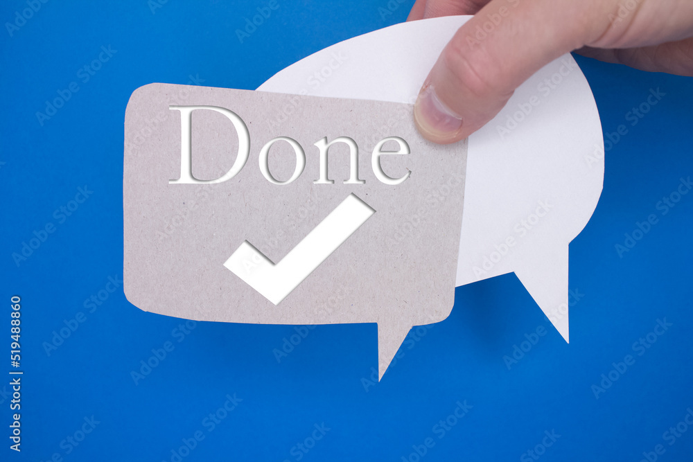 Poster speech bubble in front of colored background with done text with checkmark.