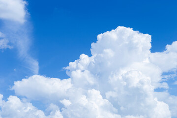 Naklejka na ściany i meble White rain cloud over blue sky background, nature and weather concept background