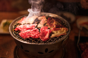 Grilling wagyu beef on charcoal grill