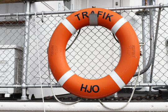 Hjo, Sweden - July 4, 2022: Lifebuoy attached to the steam ship Trafik.
