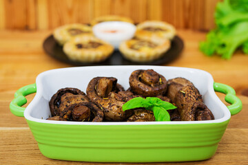 Baked mushrooms with mushrooms. Grilled champignons