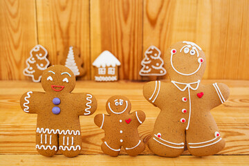 Christmas gingerbread cookies on wooden background
