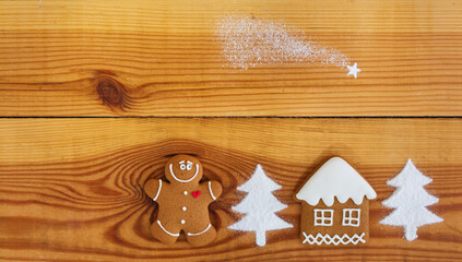 Christmas gingerbread cookies on wooden background