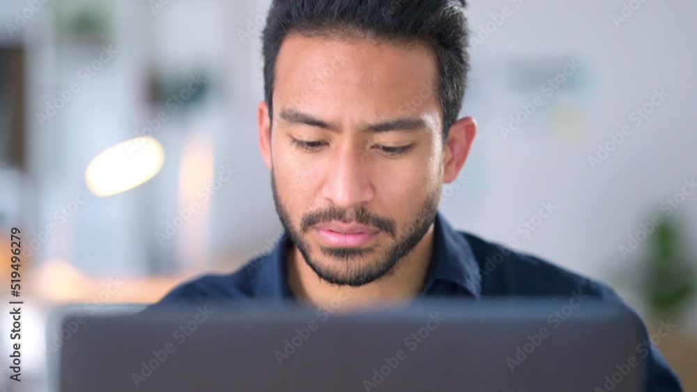 Poster focused, concentrating and thinking business man reading information on a laptop and working on a ta