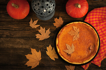Delicious pumpkin tart. Homemade pie for Thanksgiving Day or Halloween. Autumn concept. Top view
