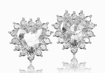 Beautiful earrings on white background. 3D Rendering.