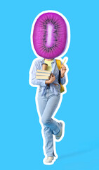 Female student with books on blue background