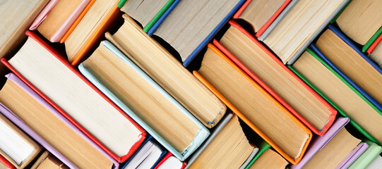 Many different books as background