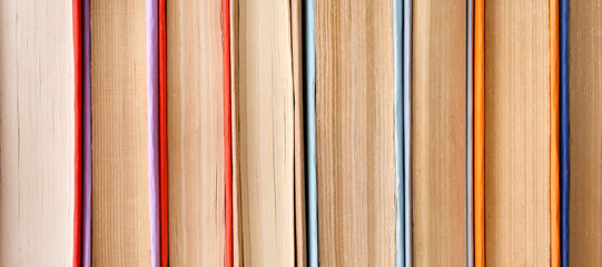 Many books as background, closeup