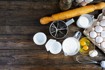 Flour with kitchen accessories for making dough. Dough for baking.