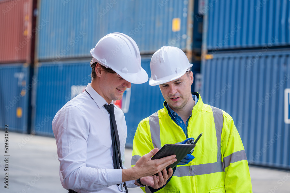 Poster Engineer and inspector working and discuss in shipping container in Container Terminal.