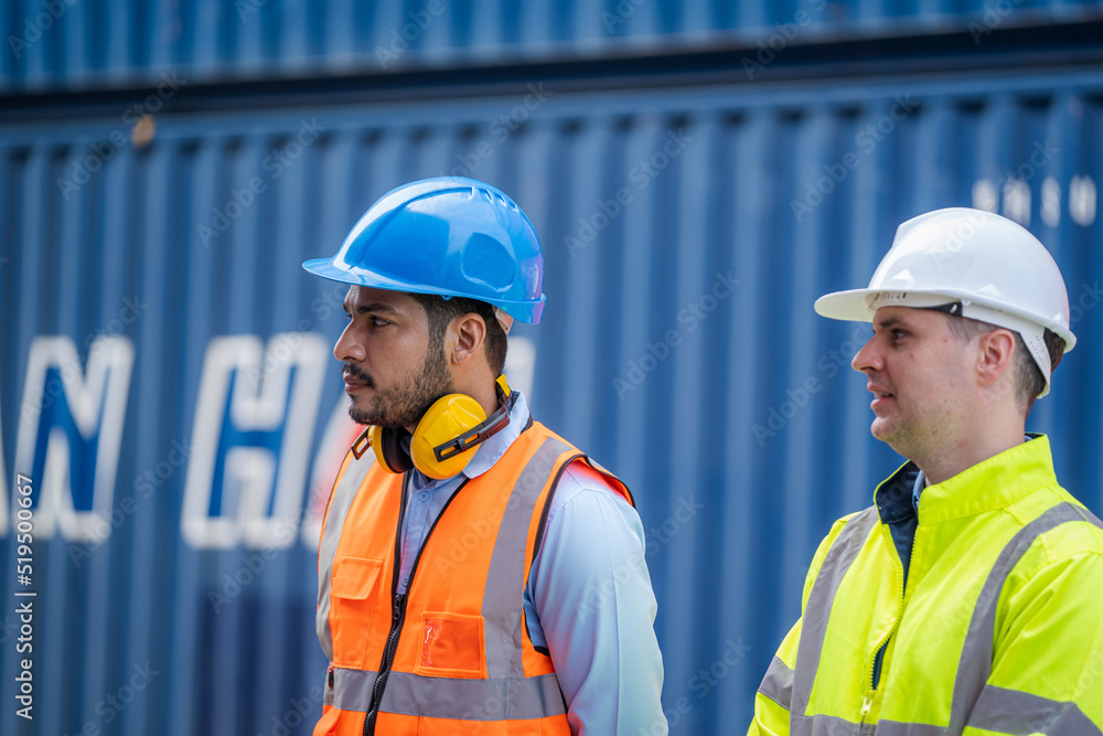 Poster Engineer and inspector working and discuss in shipping container in Container Terminal.